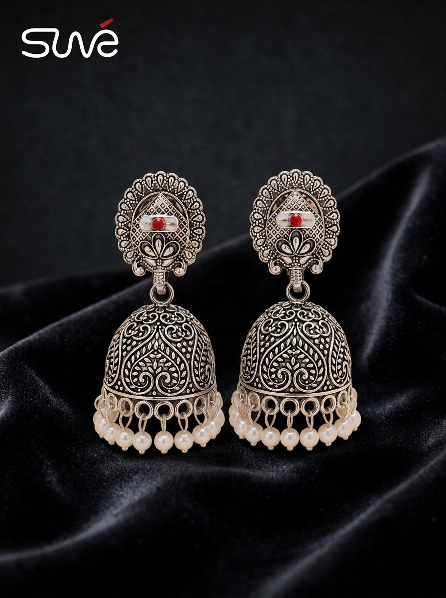Traditional Silver Bell Jhumkas with Garnet Stone & Pearl Tassel
