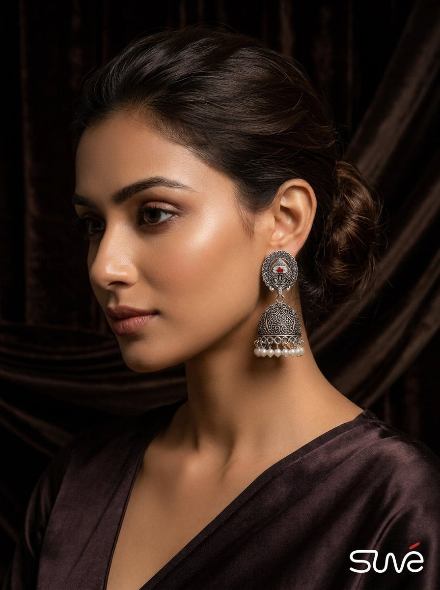 Traditional Silver Bell Jhumkas with Garnet Stone & Pearl Tassel